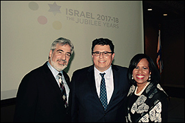 Secretary Pablos posing with Israeli Consul General Eitan levon and ABC 13's Melanie Lawson.