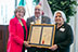 Senator Zaffirini, Dean of the Texas Senate, presents a resolution to Secretary of State Jane Nelson and Gerry Schwebel of IBC Bank. 